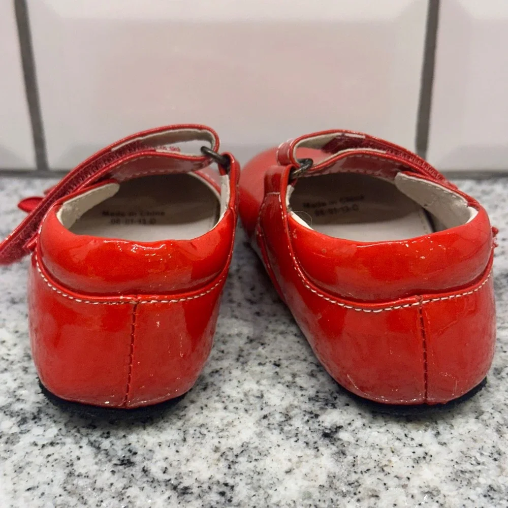 See Kai Run red patent